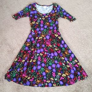 Women's LuLaRoe Nicole Dress Size Small. Colorful floral on black background